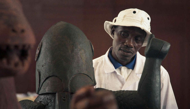 Signing to the scupltures in Dahomey