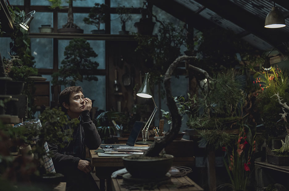 Man-su plotting in his greenhouse, No other choice by Park Chan-wook